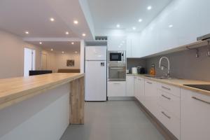 Кухня или мини-кухня в Casa 28
