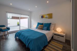 Кровать или кровати в номере Casa 28