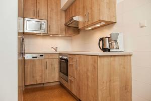 A kitchen or kitchenette at Pension Sacher - Apartments am Stephansplatz