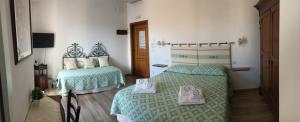 Voodi või voodid majutusasutuse Su Corittu Guesthouse toas