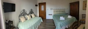 Voodi või voodid majutusasutuse Su Corittu Guesthouse toas