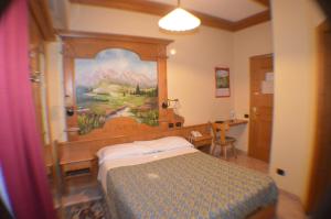Postel nebo postele na pokoji v ubytování Hotel Stelvio + 37 fotografií