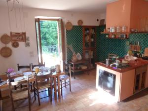 Kuchyň nebo kuchyňský kout v ubytování Casa Puccini B&B Maratea