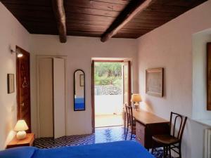 Postel nebo postele na pokoji v ubytování Casa Puccini B&B Maratea