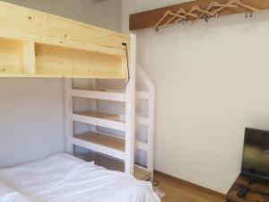 Postel nebo postele na pokoji v ubytování M's Kanazawa