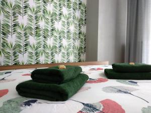 Posteľ alebo postele v izbe v ubytovaní Grand Apartament