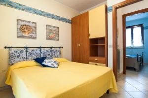 Postel nebo postele na pokoji v ubytování Casa Vacanza Minerva