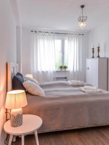 Кровать или кровати в номере 66 Apartment - Stylish Two Bedroom in Lozenets District