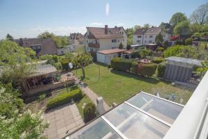 an aerial view of a house with a yard at Perfect Apartment near Opera in Bayreuth