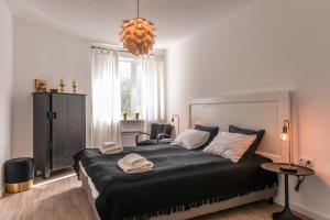 Легло или легла в стая в 66 Apartment - Stylish Two Bedroom in Lozenets District