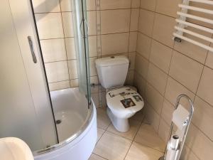 Kúpeľňa v ubytovaní Relax Kruklanki