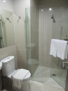 Koupelna v ubytování Harlys Residence + 20 fotografií