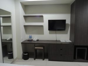 TV a/nebo společenská místnost v ubytování Harlys Residence