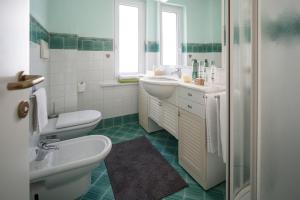 Koupelna v ubytování Hotel Astro