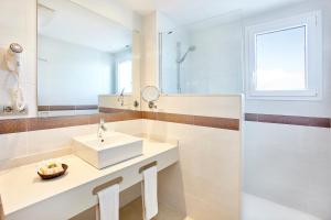 Ванная комната в Universal Hotel Marqués