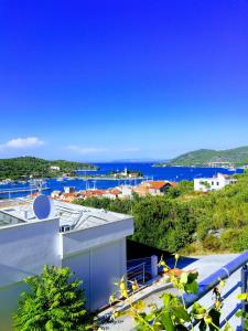 a view of the ocean from a building at Apartment Diva in Vis