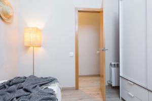 Posteľ alebo postele v izbe v ubytovaní Housalia Familia Rossellon