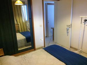 Letto o letti in una camera di Appartamento Torre Pali