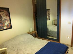 Letto o letti in una camera di Appartamento Torre Pali
