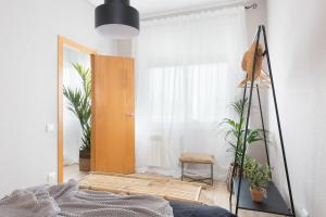 Posteľ alebo postele v izbe v ubytovaní Housalia Familia Rossellon