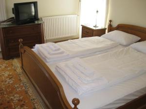 Postel nebo postele na pokoji v ubytování V3 Villa