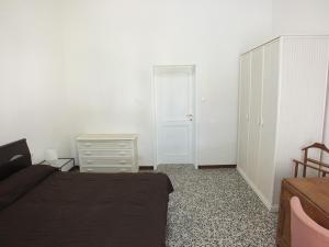 A bed or beds in a room at Villa Mattera