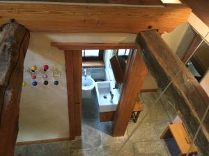 an overhead view of a bathroom in a tiny house at B&B La Quana in Domodossola