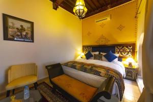 Postel nebo postele na pokoji v ubytování Riad Maison Belbaraka