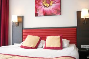 Postel nebo postele na pokoji v ubytování Hotel Allure