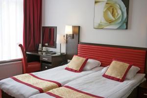 Cama o camas de una habitación en Hotel Allure