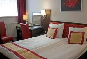 Postel nebo postele na pokoji v ubytování Hotel Allure