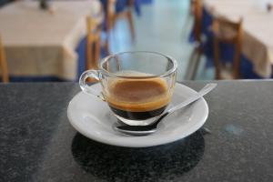Příslušenství pro přípravu čaje a kávy v ubytování Hotel Rosetta