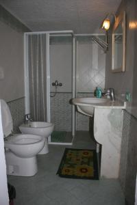 Ein Badezimmer in der Unterkunft Carrube House