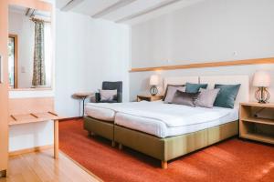 Voodi või voodid majutusasutuse Hotel Johannes-Zeche toas