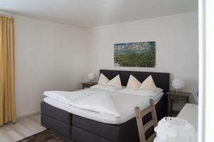 Voodi või voodid majutusasutuse Hotel Johannes-Zeche toas