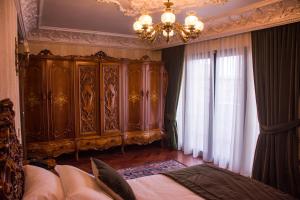Voodi või voodid majutusasutuse Hotel Epidamn Boutique & Spa toas