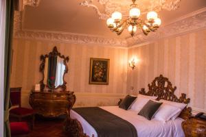 Voodi või voodid majutusasutuse Hotel Epidamn Boutique & Spa toas