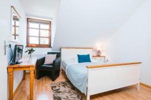 Voodi või voodid majutusasutuse Hotel Johannes-Zeche toas
