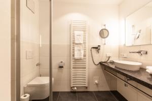Koupelna v ubytování Bollenhuthotel Kirnbacher Hof