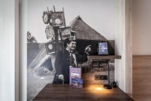 TV a/nebo společenská místnost v ubytování Bollenhuthotel Kirnbacher Hof