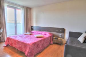 Postel nebo postele na pokoji v ubytování Hotel Pasha