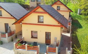 an overhead view of a house with a solar roof at Bungalows Michalka - Podhájska in Podhájska