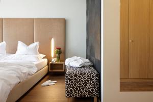 Łóżko lub łóżka w pokoju w obiekcie Hotel Nationalpark