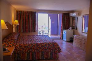 Letto o letti in una camera di Heritage Hotel