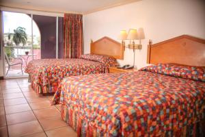 Letto o letti in una camera di Heritage Hotel