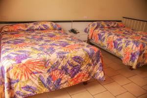 Letto o letti in una camera di Heritage Hotel