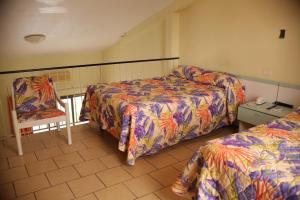 Letto o letti in una camera di Heritage Hotel
