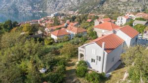 an aerial view of a small village with a lake at Queen Teuta - Sea View - Private Parking & Garden - BBQ Grill in Risan