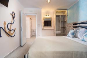 a bedroom with a large bed in a room at House Katerina Mediterranean in Sarti