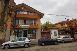 three cars parked in front of a building at SimplyComfy in Plovdiv